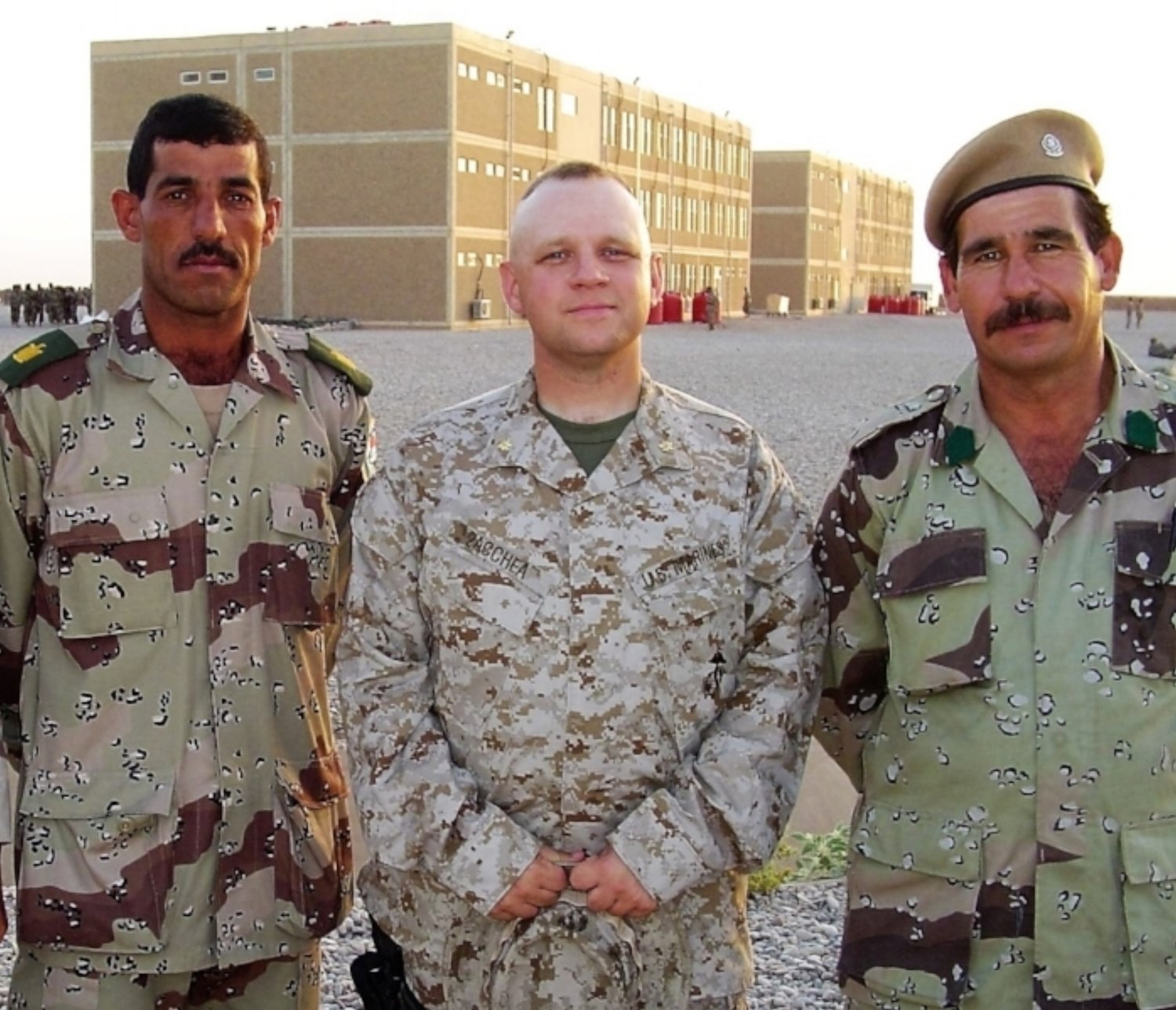 Zacchea (center) with Abdel-ridha Gibrael (in beret) at Kirkush