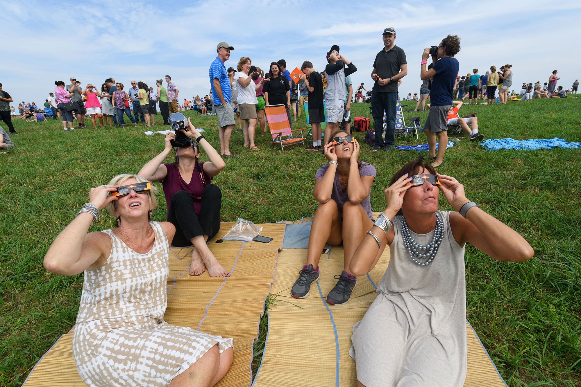students and faculty view the Aug. 21, 2017's Solar eclipse on UConn Storrs' Horsebarn Hill