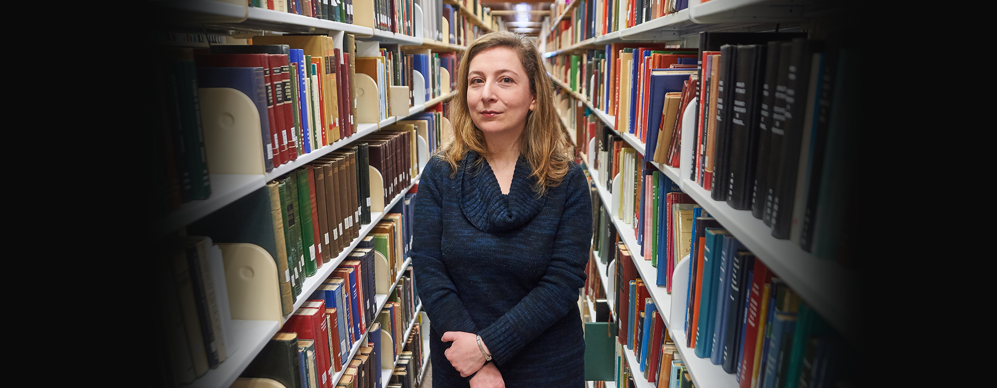 Associate professor and acclaimed novelist Ellen Litman with Illustration of Russian Architecture in a Papercut style