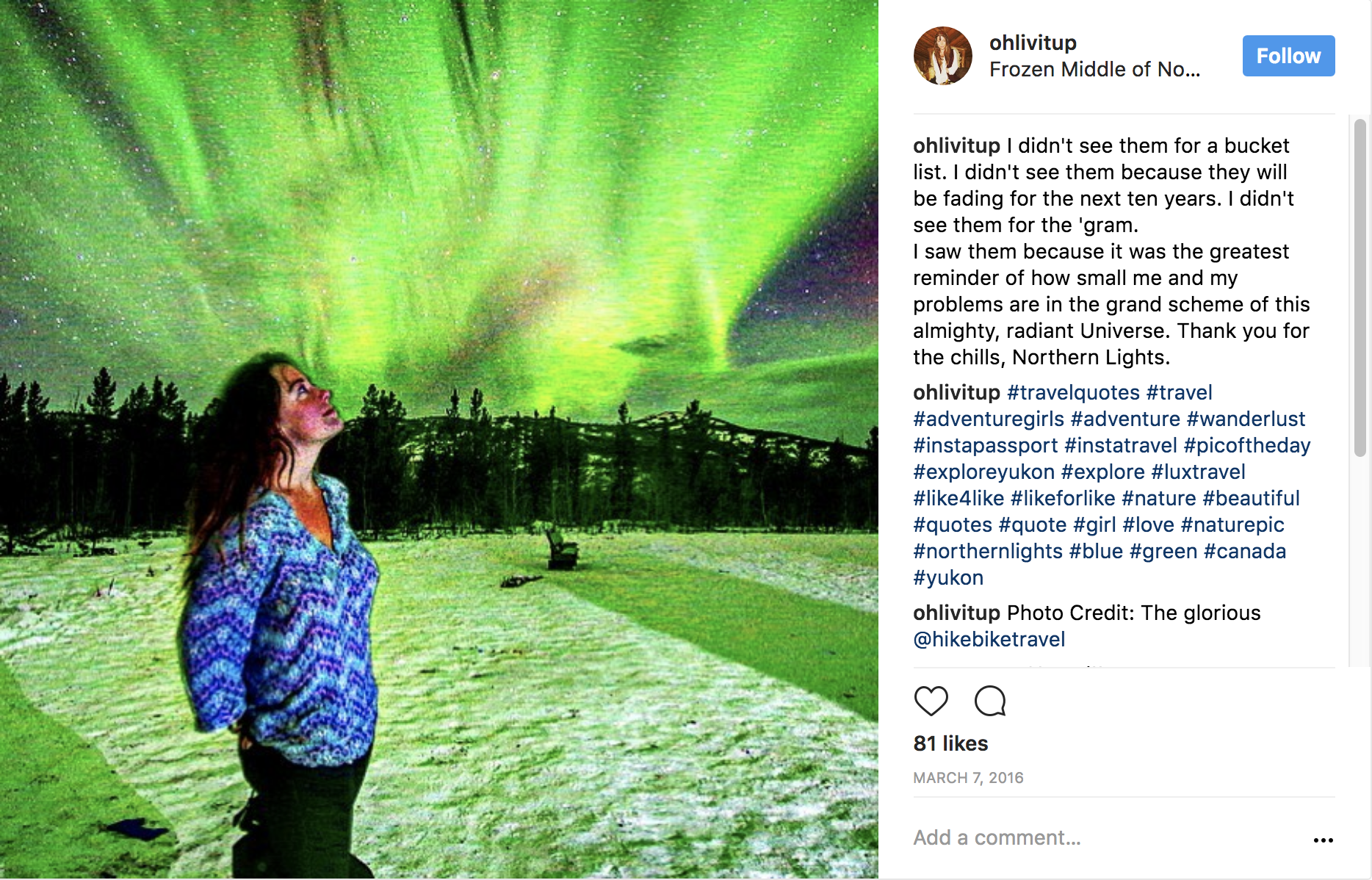 standing under the gleaming Aurora Borealis in Yukon Territory.