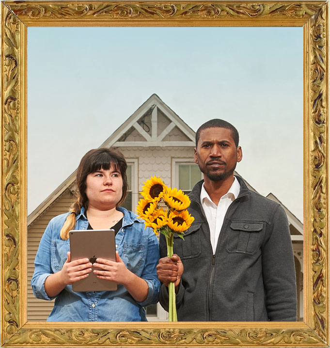 Agriculture students Marisa Kaplita and Macario Rodrigues pose “American Gothic” style at UConn's Spring Valley Farm.